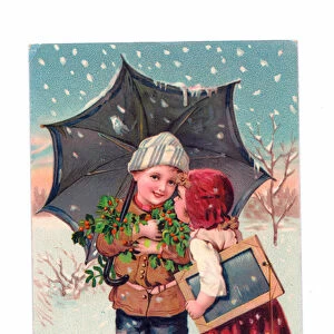 Edwardian Christmas postcard of two children carrying holly