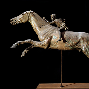 Greek Art: "jockey and horse jumping an obstacle"Bronze sculpture