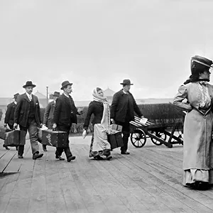 Immigrants Arrive At Ellis, New York, USA, c. 1895-1910 (b/w photo)