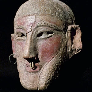 Mans mask with earrings in the nose and ears, 7th-6th century BC (terracotta)