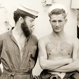 Two US Navy sailors in overalls, 1942 (sepia Photo)