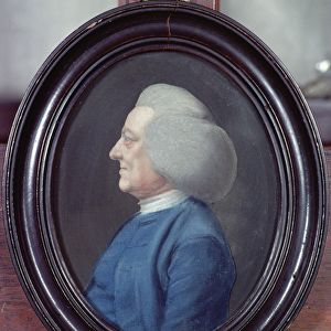 Portrait of a man wearing a Blue Coat