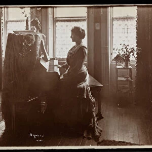 Portrait of Mrs. Elliott or her female relative playing the piano