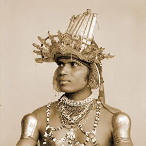 Portrait of a Sri Lankan Dancer with embossed silver helmet, c. 1890 (photo)