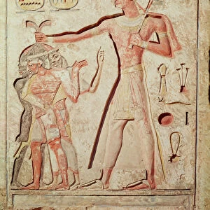 Relief depicting Ramesses II (1279-1213 BC) smiting his enemies (painted limestone)