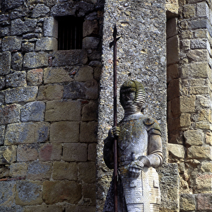 Statue of a Cathar warrior on the door of avignonet in Lauragais (31)