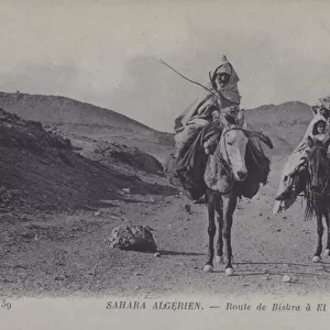 Travellers in the Algerian Sahara on the road from Biskra to El Kantara (b / w photo)