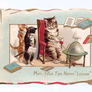 A Victorian greeting card of a cat wearing a pince nez pointing at a globe ball to two