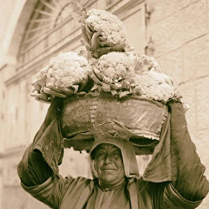 Peasant women carrying cauliflower head 1934