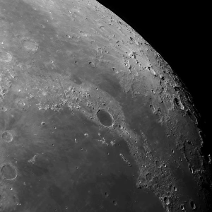 Close-up view of the moon showing impact crater Plato