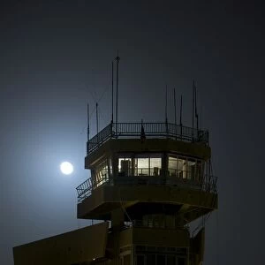 COB Speicher control tower under a full moon