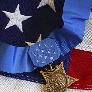 The Medal of Honor rests on a flag during preparations for an award ceremony