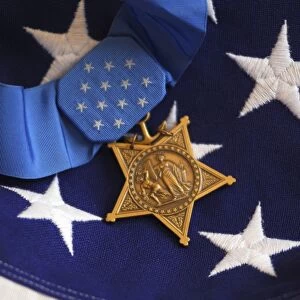 The Medal of Honor rests on a flag during preparations for an award ceremony