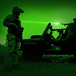 Night vision view of U. S. Special Forces on patrol