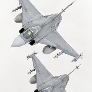 A pair of Hungarian Air Force JAS-39 Gripen over Lithuania