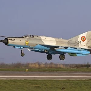 A Romanian Air Force MiG-21MF LanceR-C landing at an airbase in Romania