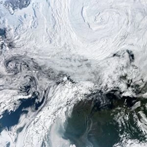 Satellite view of large and powerful cyclone churning over the Arctic