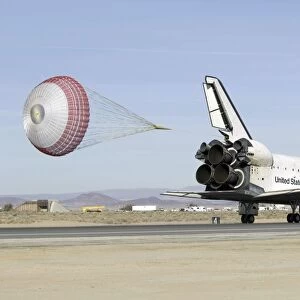 Space Shuttle Endeavour with its drag chute deployed