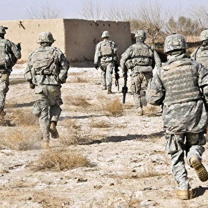 U. S. Army soldiers respond to a small arms attack in Badula Qulp, Afghanistan