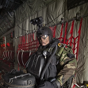 U. S. Navy Seal combat diver prepares for HALO jump operations