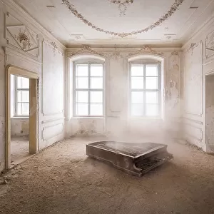 Abandoned Piano in the Dust