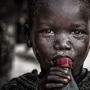 Child with a bottle - South Sudan