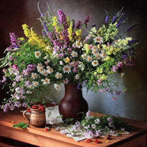 Still life with wildflowers and berries