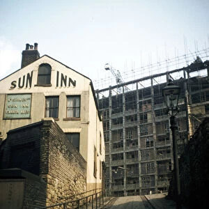 Sun Inn, South Street showing Park Hill Flats under construction