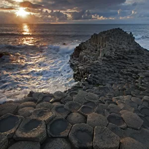 Sunset over the sea at Giants Causeway, Causeway coast, Antrim county