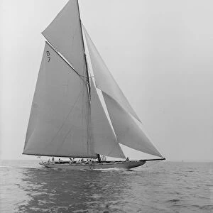 The 15 Metre Istria sailing close-hauled, 1913. Creator: Kirk & Sons of Cowes