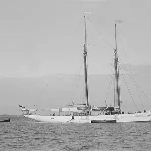 The 161 ton schooner Amphitrite at anchor, 1922. Creator: Kirk & Sons of Cowes