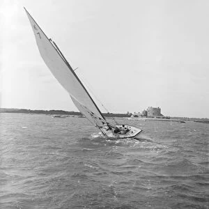 The 7 Metre yacht Genevia (K7) beating to windward, 1912. Creator: Kirk & Sons of Cowes