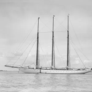 The American three mast schooner Karina at anchor, 1912. Creator: Kirk & Sons of Cowes