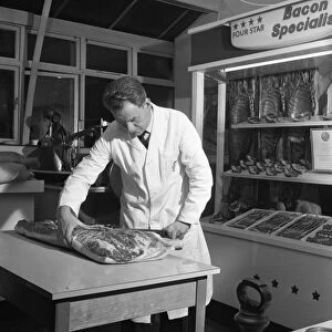 Butcher from Danish Bacon giving a demonstration, Kilnhurst, South Yorkshire, 1961