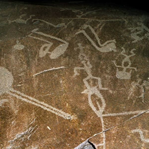 Carved Petroglyph (People, deers, elks, birds, boots and circles), 4th-3rd millenium BC
