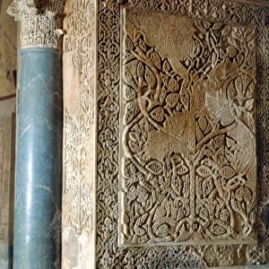 Detail of a column, a capital and the wall of the Hall of Ambassadors in Medina Azahara