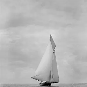 The cutter racing yacht Terpsichore running downwind, 1922. Creator: Kirk & Sons of Cowes