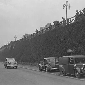 Daimler of CM Simpson and a Morris loudspeaker van on Madeira Drive, Brighton, RAC Rally, 1939