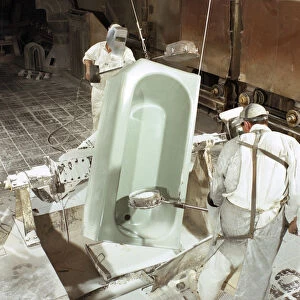 Enamelling a steel bath at Ideal Standard, Hull, Humberside, 1967