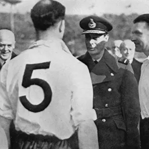 English footballer Eddie Hapgood meeting King George VI, c1937-c1944