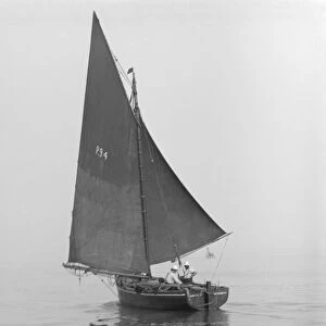 Fishing Smack under sail, 1911. Creator: Kirk & Sons of Cowes