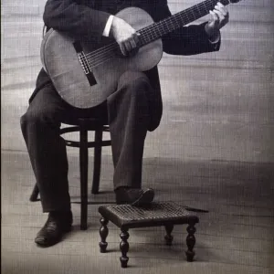 Francisco Tarrega Eixea (1852-1909), guitarist and composer, portrait playing guitar