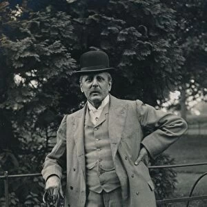 A gentleman wearing a suit and bowler hat c1910