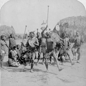 Heroic sports of the Kraal, a Zulu war dance, Zululand, South Africa, 1901. Artist: Underwood & Underwood