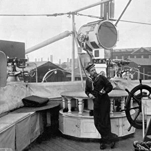 A holophote on board HMS Imperieuse, 1896. Artist: A Debenham