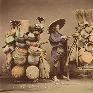 [Japanese Man Posing with Baskets, Brooms and Feather Dusters], 1870s. Creator: Unknown