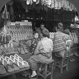 Japanese shoe shop, early 20th century. Artist: Keystone View Company