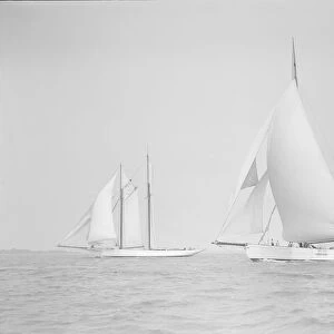 The ketch Cariad and schooner Irma racing downwind, 1911. Creator: Kirk & Sons of Cowes
