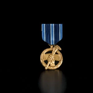 NASA Outstanding Leadership Medal awarded to Sally Ride, 1987. Creator: Unknown