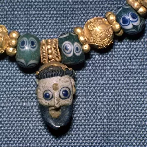 Phoenician glass head on Etruscan Necklace, c7th century BC